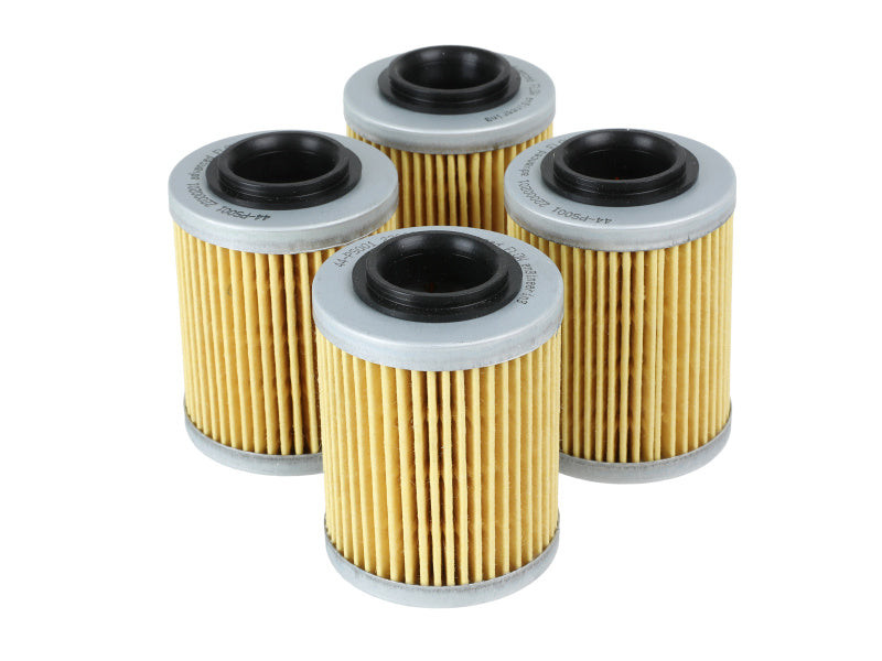 Four afe PROGUARD oil filters stacked together, featuring a pleated paper design with metal end caps for enhanced filtration.
