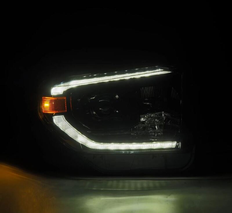 AlphaRex projector headlights for 14-21 Toyota Tundra in black with sequential signals and daytime running lights.