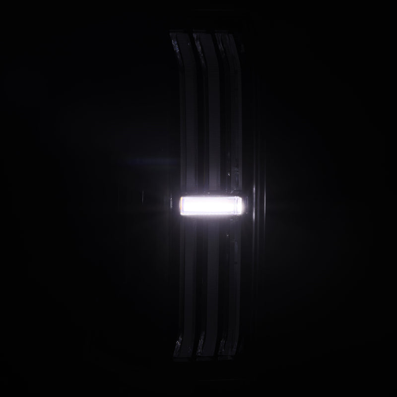 AlphaRex NOVA-Series LED prismatic tail lights for 24-25 Toyota Tacoma in sleek black design, enhancing visibility and style.