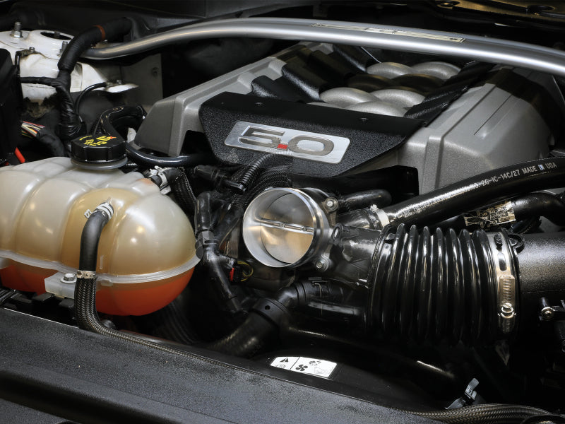 aFe POWER throttle body installed on a Ford Mustang GT 15-17 V8 5.0L engine, showcasing enhanced airflow and performance.