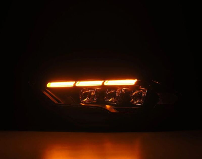 AlphaRex NOVA LED projector headlights for 18-20 Ford Mustang with black housing and sequential signal lights.