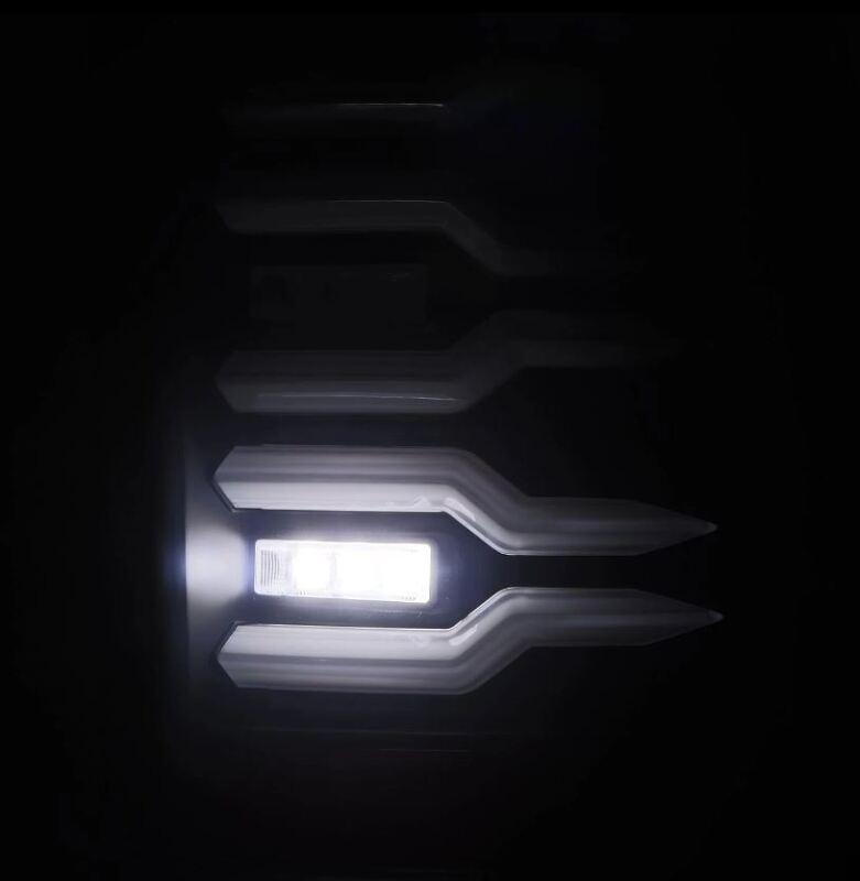 AlphaRex Luxx-Series LED tail lights for 07-14 Chevrolet Silverado with a sleek black design and smoked lens.