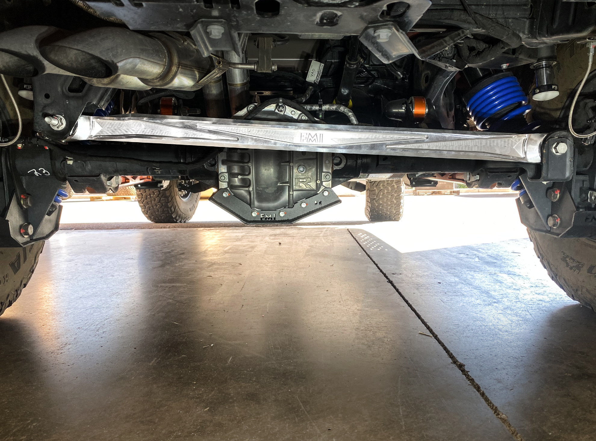 2021+ Bronco billet panhard bar with ultra-flex joint installed under the vehicle, showcasing durability and performance.