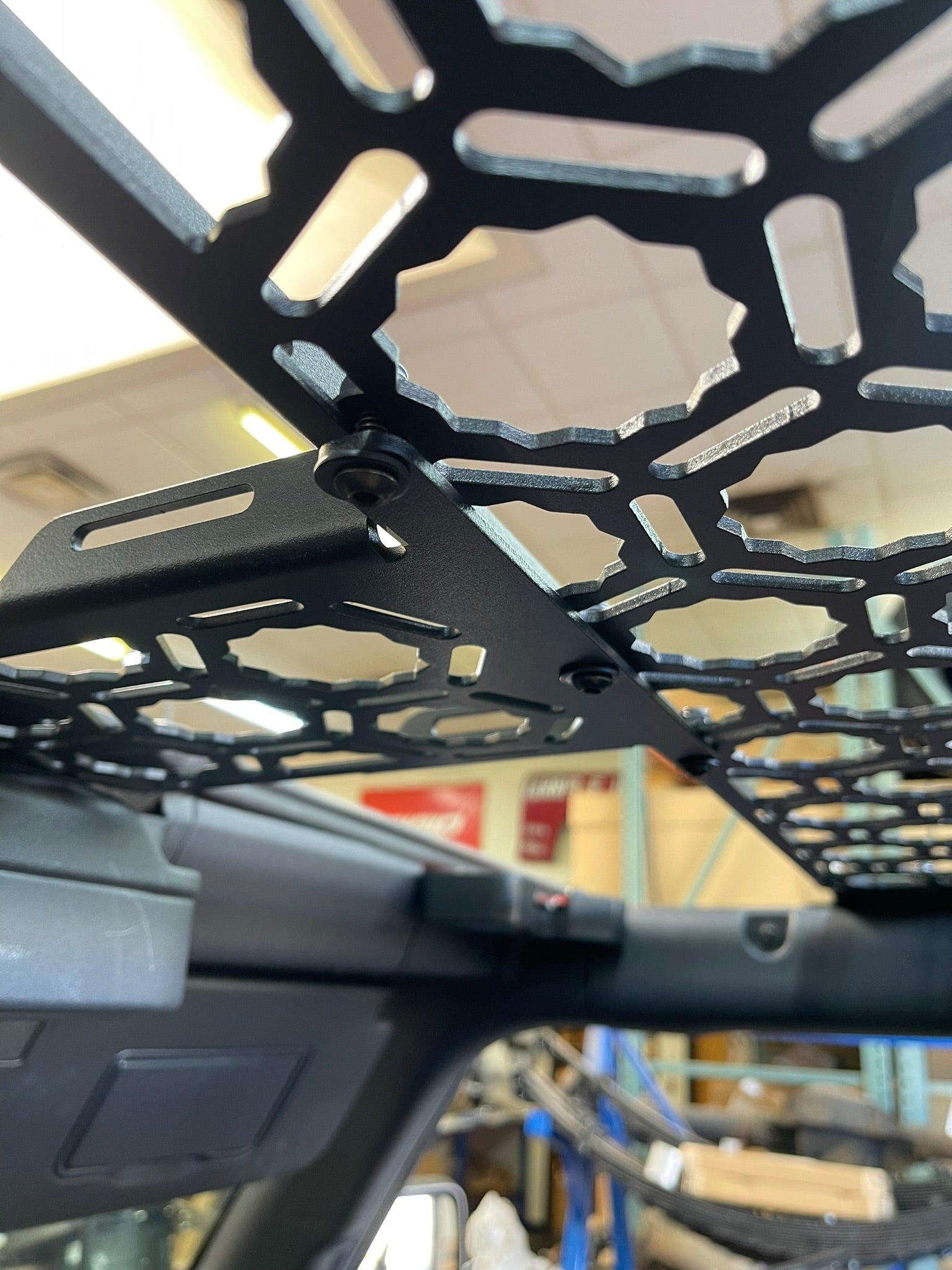 Bronco Raptor 2022 inside front roof mount with short panel add-on, showcasing durable metal construction and secure attachment.