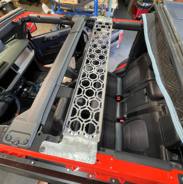 Bronco Raptor 2022 with Adapt-A-Panel inside roof mount installed across the rear seat area, showcasing a hexagonal design.
