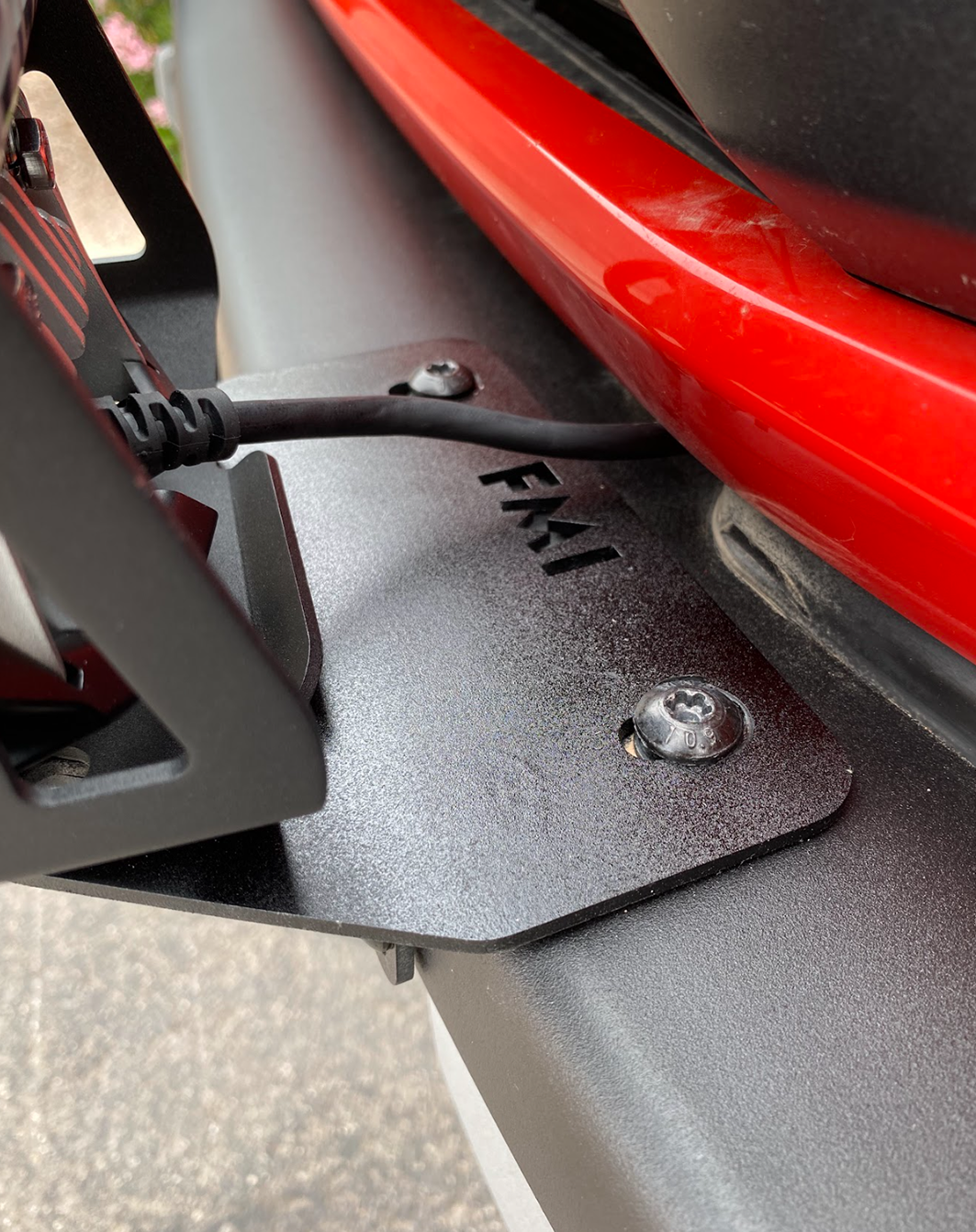 Light mount brackets for 2022-2024 Bronco Raptor's stock modular bumper, showcasing durable metal construction and secure attachment.