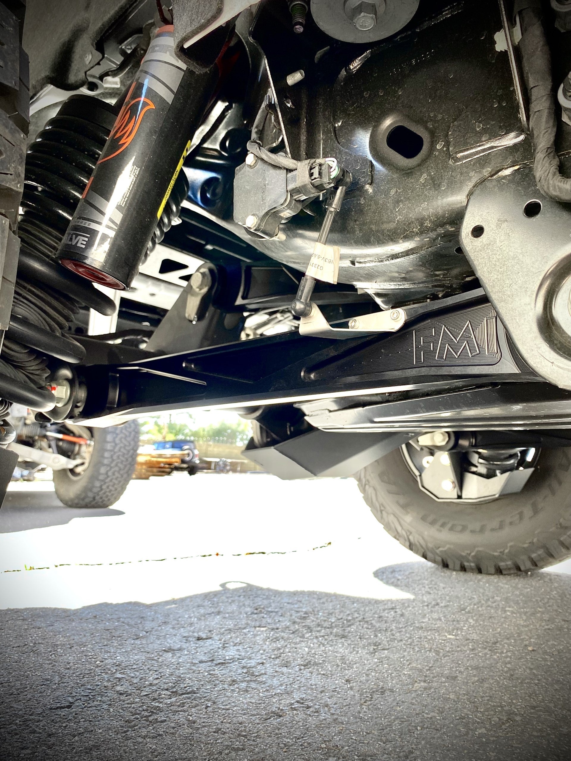 Billet aluminum rear suspension arms with ultra-flex joints installed on a 2022 Bronco Raptor, showcasing durability and performance.