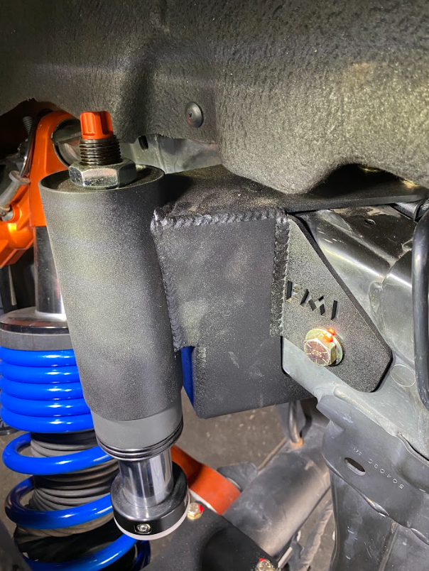 Rear hydraulic bump stop kit for 2022+ Bronco Raptor, showcasing components and installation details for enhanced offroad performance.