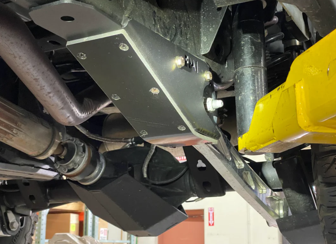 2022 Bronco Raptor rear lower arm frame guard with HDPE slide installed, showcasing durable protection and design.