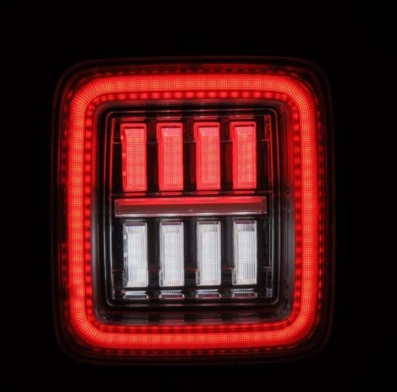 AlphaRex NOVA-Series LED tail light for 2018-2024 Jeep Wrangler JL featuring a modern design with bright red and white LEDs.