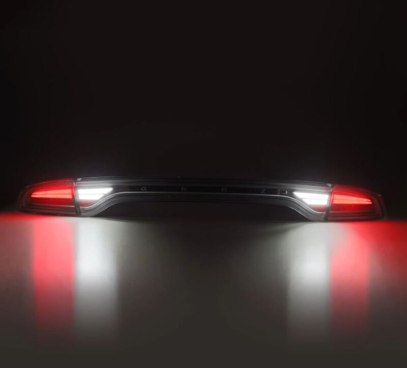 AlphaRex Nova-Series LED tail lights for 2015-2023 Dodge Charger in black, featuring sleek design and bright illumination.