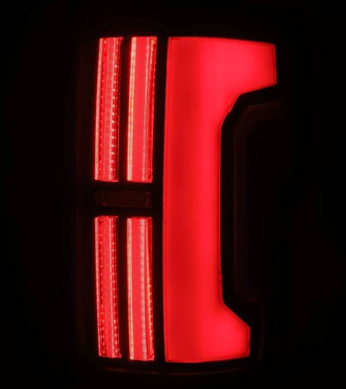 AlphaRex Nova-Series LED tail lights for 2007-2013 Toyota Tundra in black and red design, showcasing bright LED illumination.