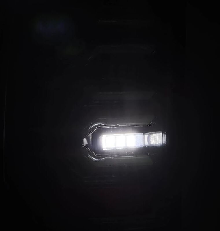AlphaRex LUXX-Series LED tail lights for 07-13 Chevrolet Silverado 1500, featuring a sleek black design and bright illumination.