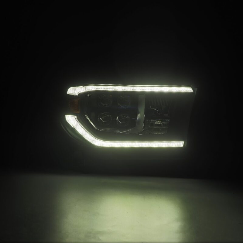 AlphaRex NOVA LED projector headlights for 07-13 Toyota Tundra and 08-17 Sequoia with black housing and sequential turn signals.