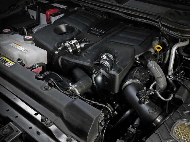 aFe BladeRunner OER Series Coupling and Clamp Kit installed in a Toyota Tundra engine bay, showcasing performance upgrades.
