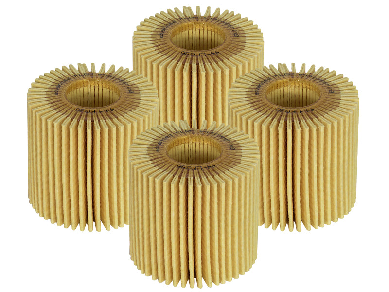 afe PROGUARD oil filters stacked together, showcasing their pleated design for effective filtration in vehicles.
