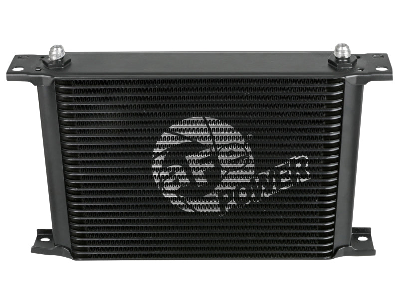 AFE BladeRunner oil cooler measuring 10 inches long, 2 inches wide, and 8 inches high, featuring a sleek design.