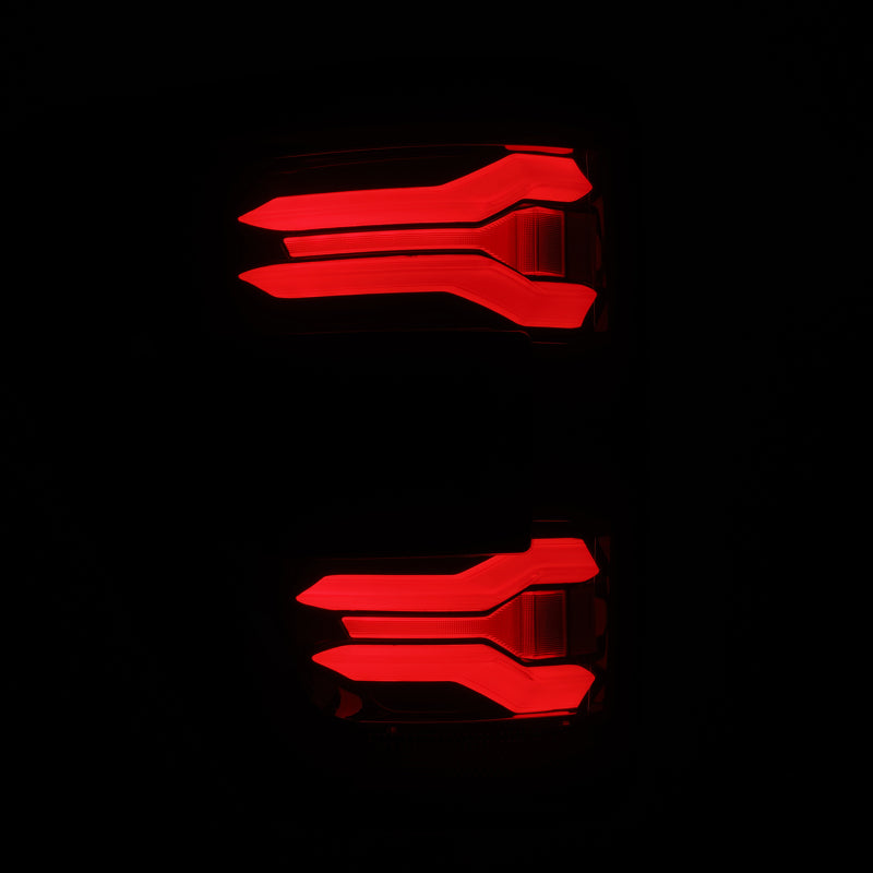 AlphaRex LUXX LED taillights for 21-23 Ford F-150 in black and red, featuring a sleek design and BLIS technology.