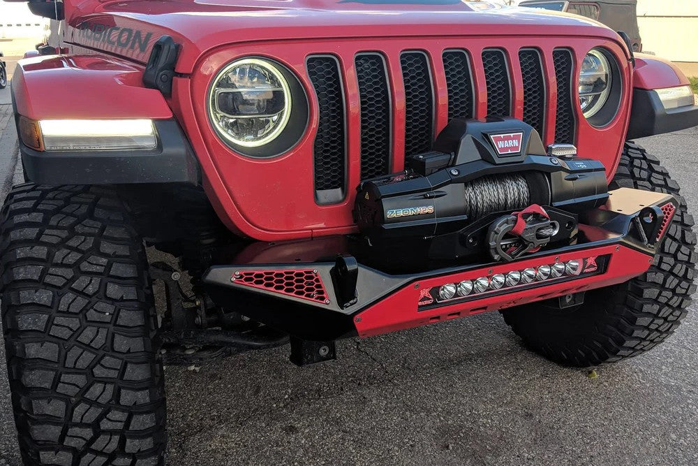 Blaze Front Bumper for Jeep Wrangler JL and Gladiator JT, featuring a winch and LED light bar for offroad performance.