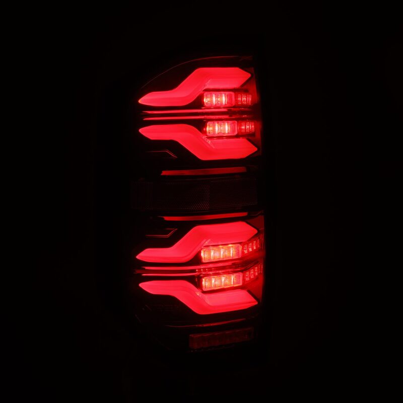 AlphaRex LUXX LED taillights for 14-21 Toyota Tundra in black and red with sequential signal and activation light.