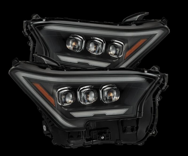 AlphaRex 2024 Toyota Tacoma NOVA-Series projector headlights in black with activation light, designed for enhanced visibility and style.