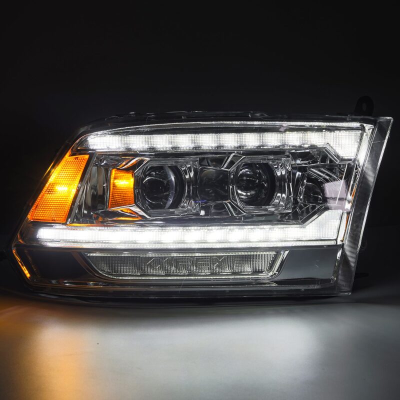 AlphaRex PRO-Series projector headlights for 09-18 Ram 1500 with chrome finish, sequential signals, and DRL features.