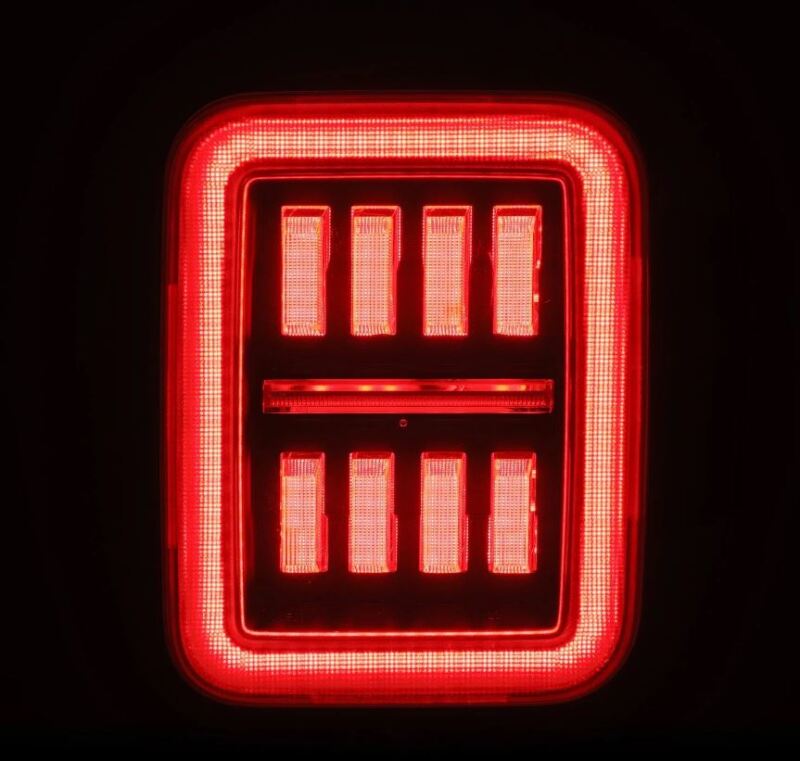 AlphaRex 19-24 Jeep Gladiator JT Nova-Series prismatic LED tail light in alpha-black with a sleek red design.