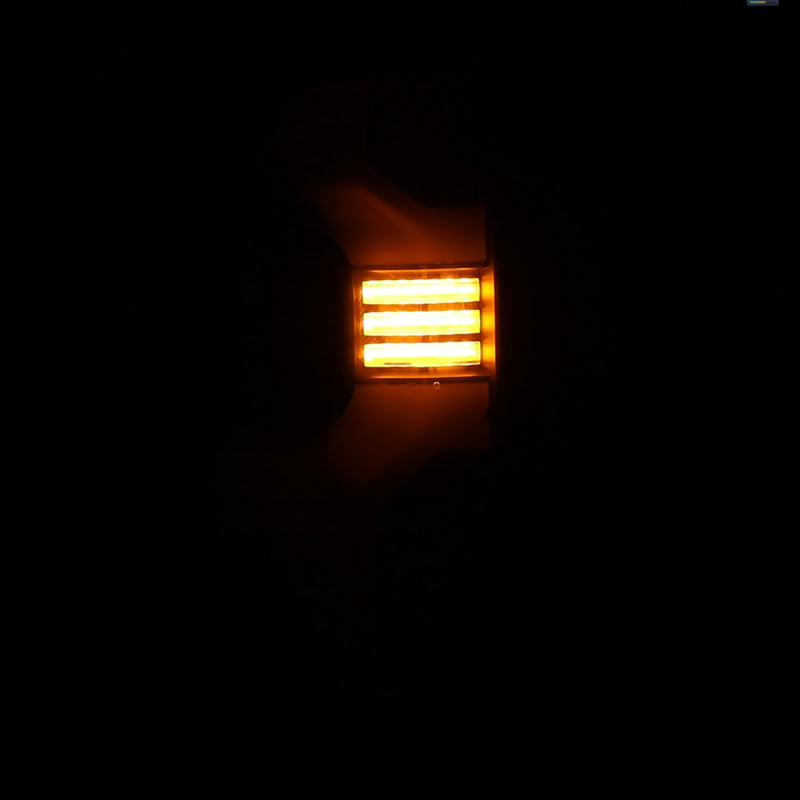 AlphaRex LUXX-Series LED tail light for 19-24 Chevy Silverado 1500 and 20-24 2500HD/3500HD in black, illuminated.