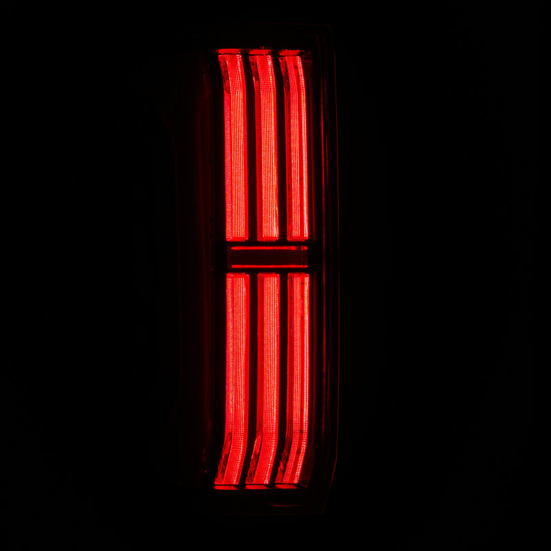 AlphaRex NOVA-Series LED prismatic tail light for 24-25 Toyota Tacoma in black and red, showcasing a sleek design.
