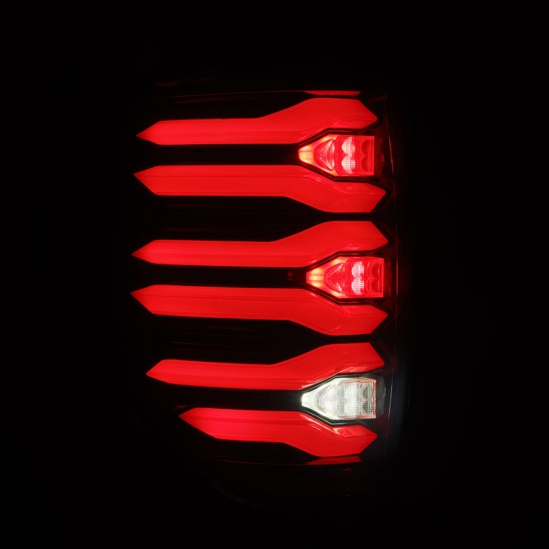 AlphaRex LUXX LED taillights for 09-14 Ford F150 featuring black and red housing with a modern design.