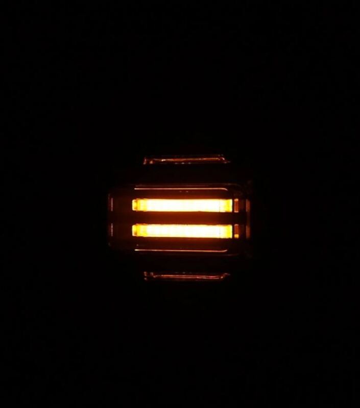 AlphaRex Nova-Series LED tail light for 2021-2024 Ford Bronco, featuring a sleek black design and bright amber illumination.