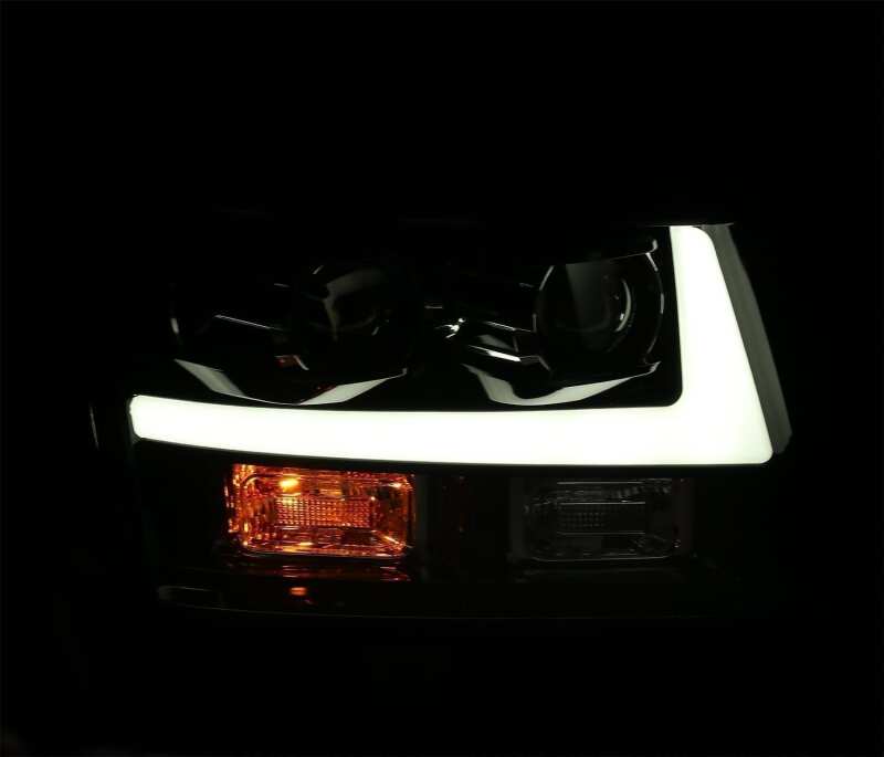 AlphaRex LUXX-Series LED projector headlights for 07-14 Chevrolet Tahoe/Suburban, featuring black housing and DRL.