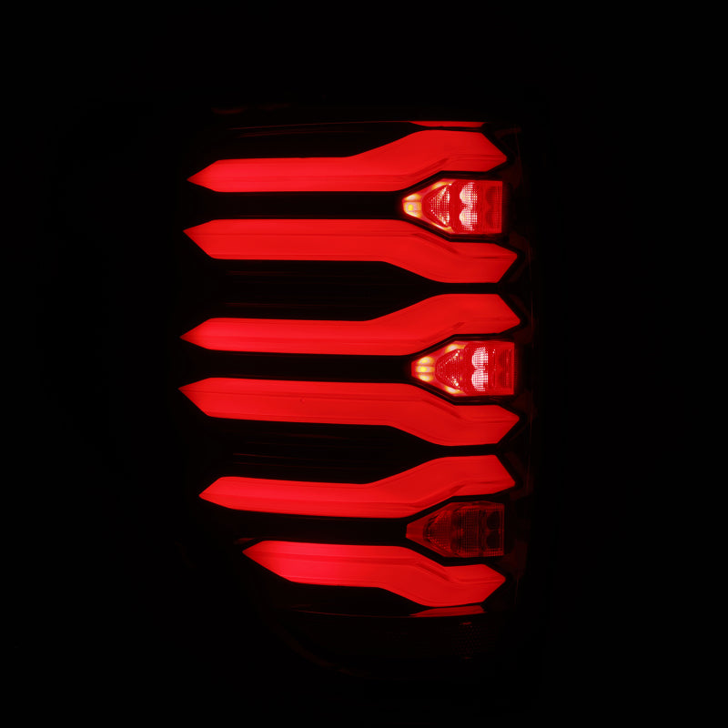 AlphaRex LUXX LED taillights for 09-14 Ford F150 in black and red housing, showcasing a sleek, modern design.