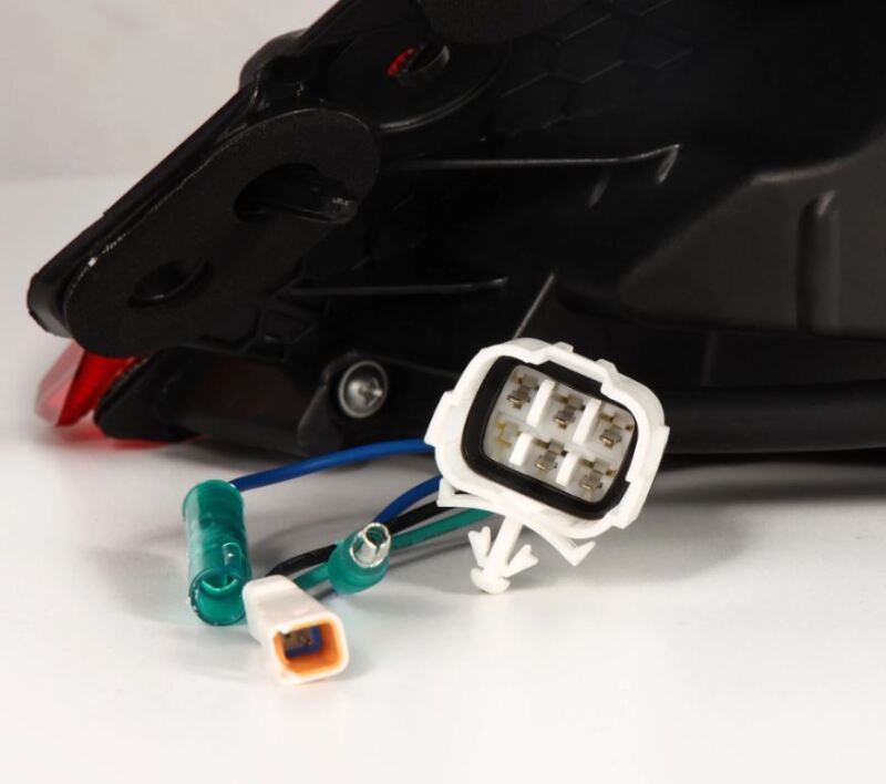 AlphaRex 22-24 Toyota GR86 LUXX LED taillights in black smoke with wiring connectors for installation.