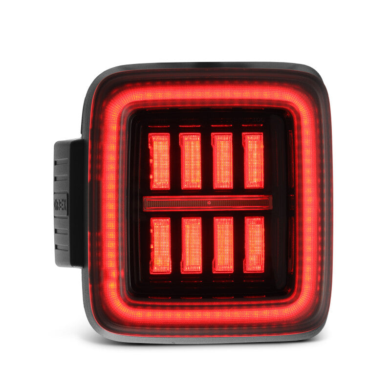AlphaRex NOVA Prismatic LED taillights for 2018-2023 Jeep Wrangler JL in Alpha-Black finish, featuring a modern design.