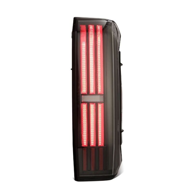 AlphaRex NOVA-Series black LED tail lights for 2022-2024 Toyota Tundra showcasing a sleek, modern design with bright red illumination.
