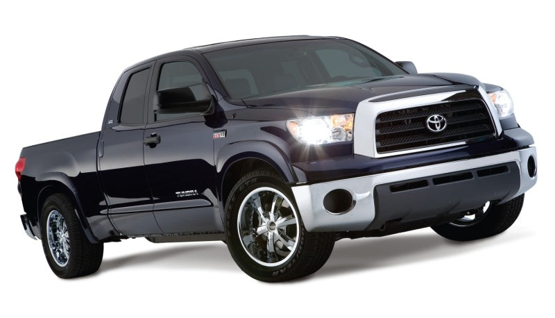 Bushwacker 07-13 Toyota Tundra OE style flares in black, designed for fleetside trucks, includes factory mudflaps.