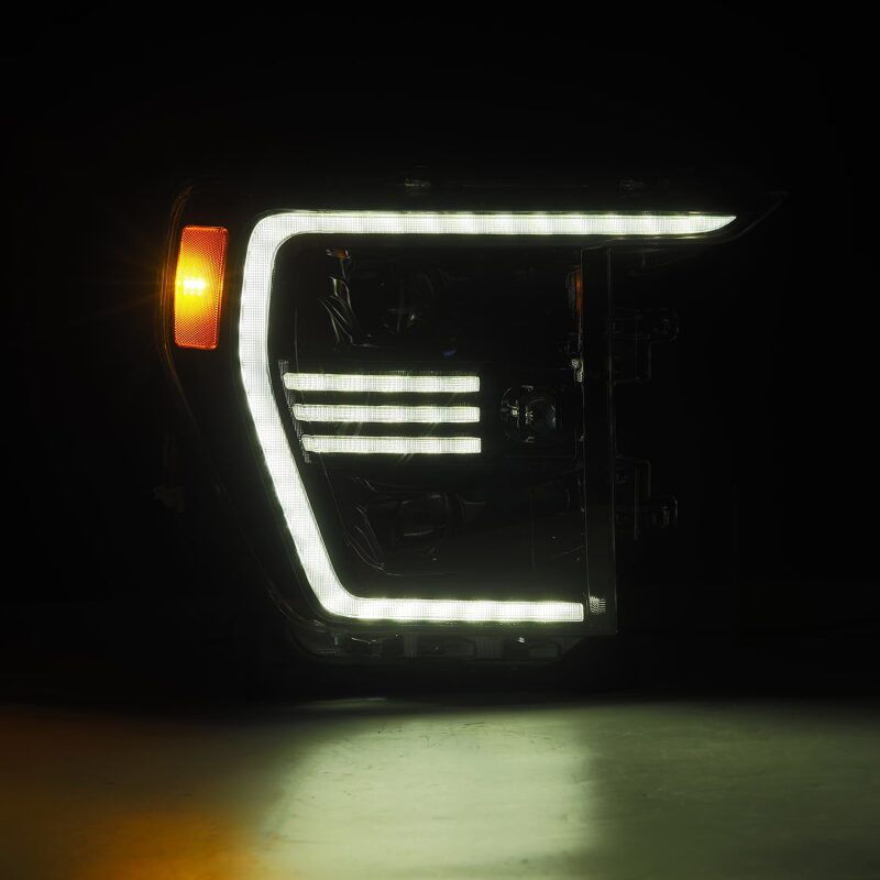 AlphaRex 21-22 Ford F150 PRO-Series projector headlights in black with sequential signal and active light features.