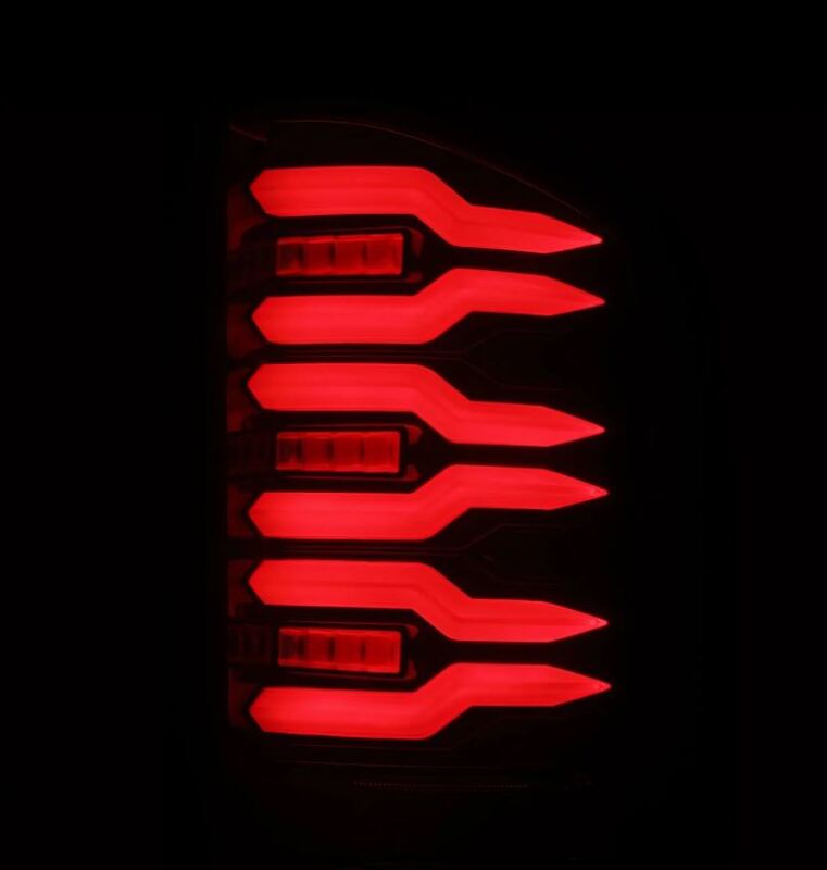 AlphaRex Luxx-Series LED tail lights for 07-14 Chevrolet Silverado, featuring a sleek black and red design.