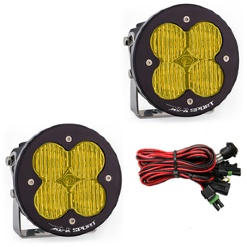 Baja Designs XL R Sport Series amber LED light pods with wide cornering pattern, includes wiring harness.