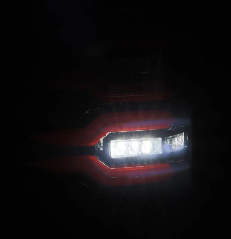 AlphaRex Luxx-Series LED tail lights for 07-13 GMC Sierra 1500 and 07-14 2500/3500HD in black and red design.