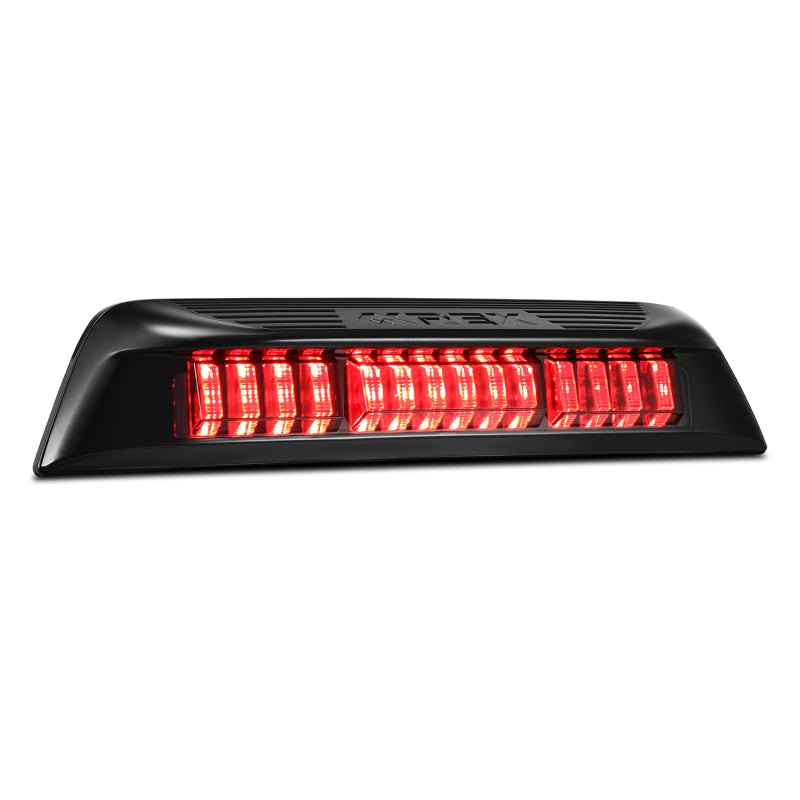 AlphaRex LUXX-Series LED 3rd brake light for 2016-2023 Toyota Tacoma in black smoke finish, featuring bright red LEDs.