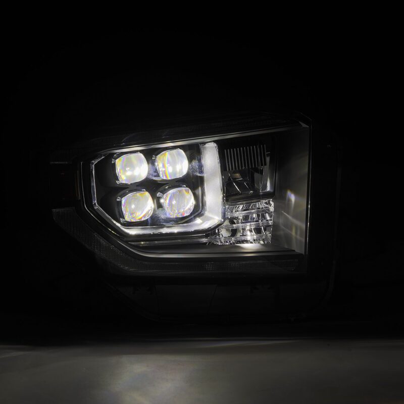 AlphaRex NOVA-Series LED projector headlights for 14-21 Toyota Tundra in black with active light and sequential signals.