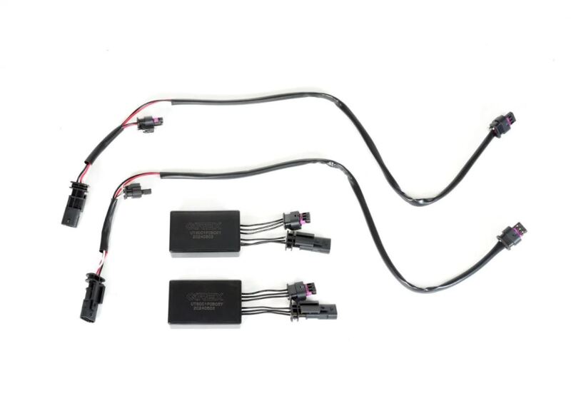 AlphaRex fog lights decoder wiring adapter for 2017-2023 Tesla Model 3 and Y, featuring two connectors for easy installation.