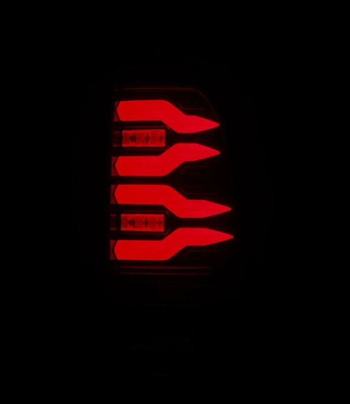 AlphaRex LUXX-Series LED tail lights for 97-03 Ford F150 and 99-16 Ford Super Duty, featuring a black and red design.