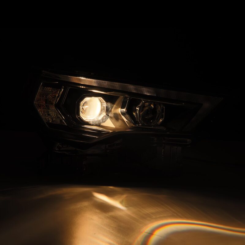 AlphaRex 14-22 Toyota 4Runner PRO-Series projector headlights in black, featuring sequential signals and daytime running lights.