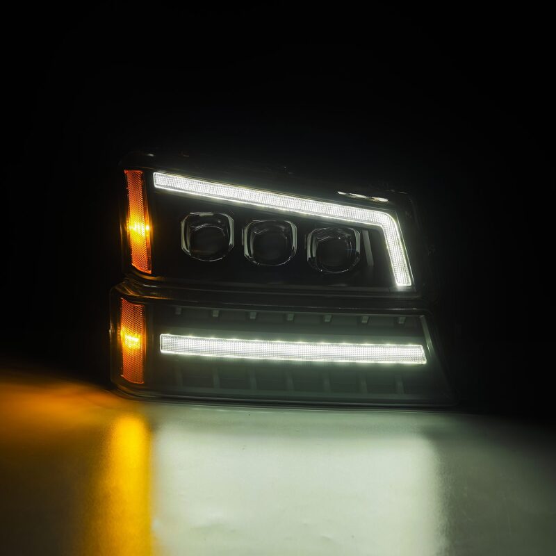AlphaRex Black NOVA LED projector headlights for 03-06 Chevy Silverado and Avalanche, featuring sleek design and bright illumination.