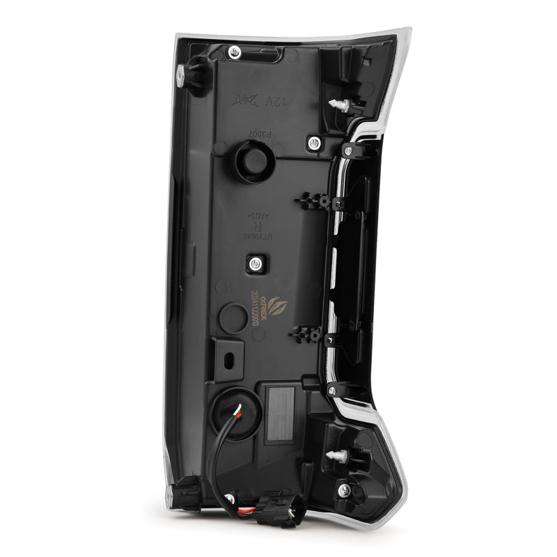 AlphaRex NOVA-Series LED prismatic tail lights for 24-25 Toyota Tacoma in black and red, showcasing a sleek design.