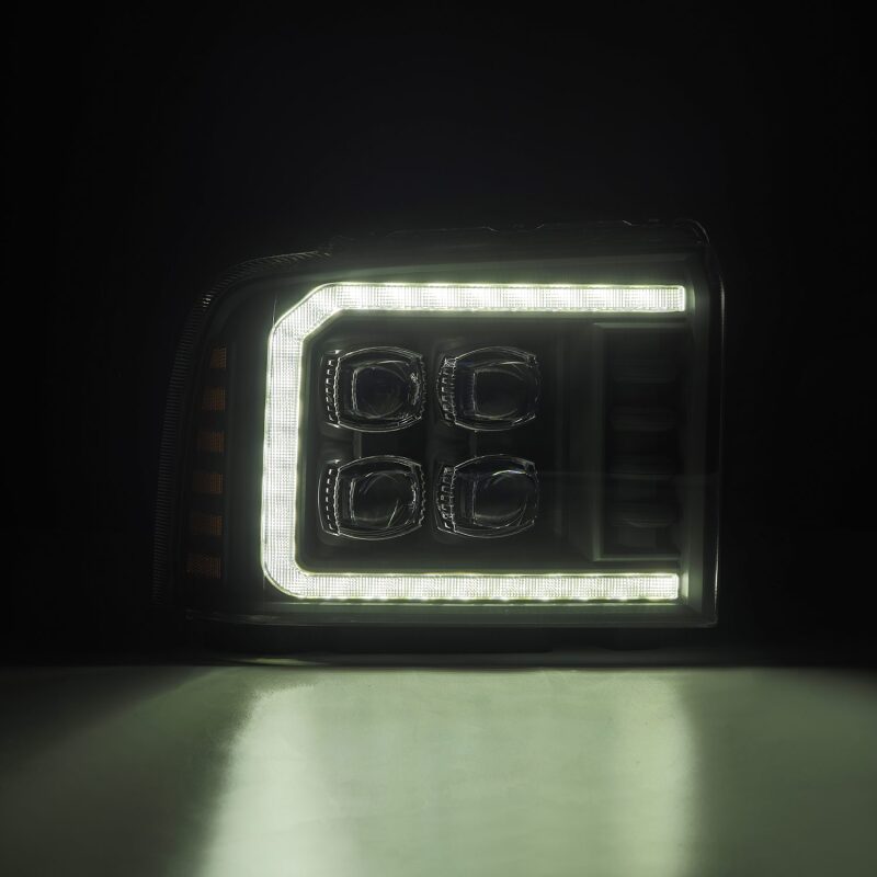 AlphaRex NOVA LED projector headlight for 05-07 Ford Super Duty, featuring sequential signals and bright daytime running lights.