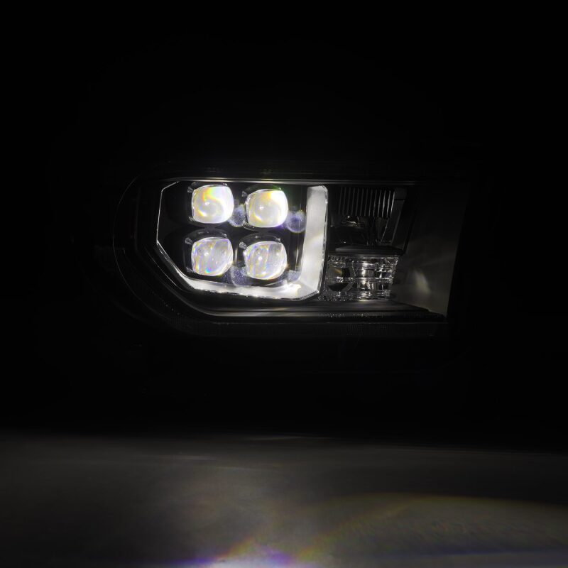 AlphaRex NOVA LED projector headlights for 07-13 Toyota Tundra and 08-17 Sequoia with black housing and sequential turn signals.